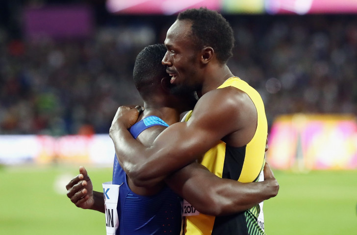 Usain Bolt hugs Justin Gatlin after the US sprinter has beaten him in the 100 metres, the final individual race of his career at the IAAF World Championships in London ©Getty Images