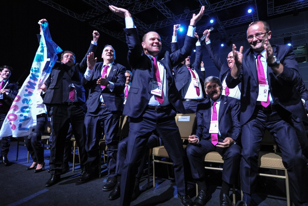 Lausanne's bid team celebrates after they are awarded the 2020 Winter Youth Olympic Games ©Getty Images