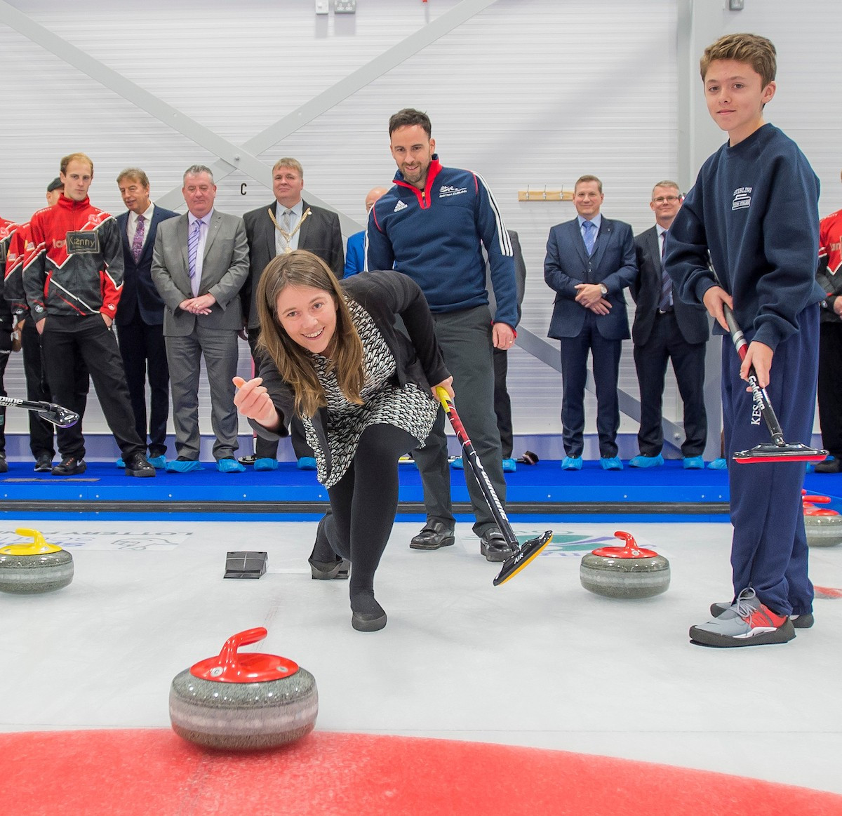 Aileen Campbell, Minister for Public Health and Sport, delivers the opening stone at the newly opened National Curling Academy in Stirling, Scotland ©Alan Peebles
