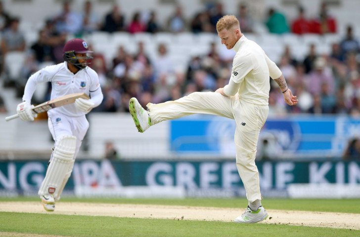England's Ben Stokes reacts on the second day of play in the Headingley test as West Indies' Shai Hope makes runs off one of his deliveries ©Getty Images