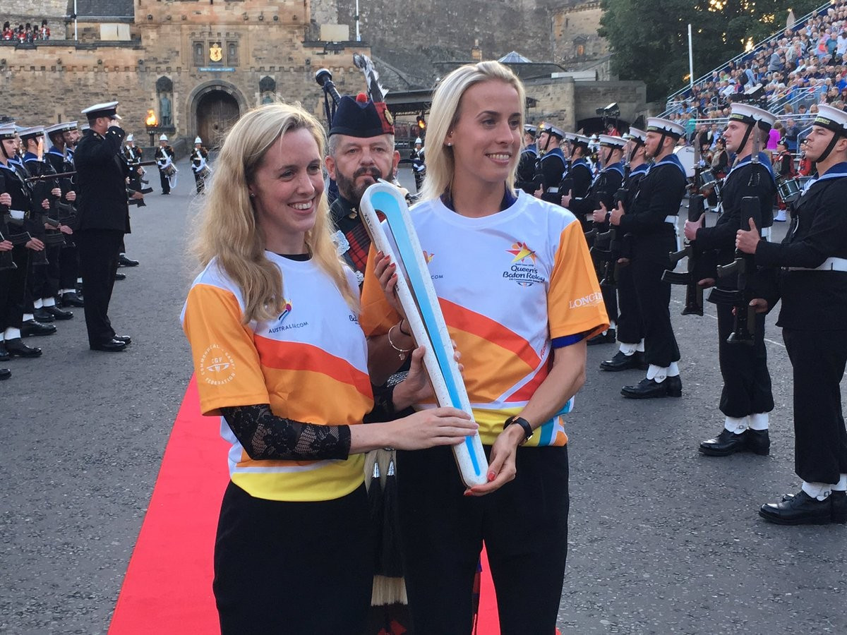 Two-time Commonwealth Games swimming gold medallist Hannah Miley, and Lynsey Sharp, the 800 metres silver medallist at Glasgow 2014, carried the Queen's Baton down the Castle Esplanade during its last day in Scotland ©Team Scotland