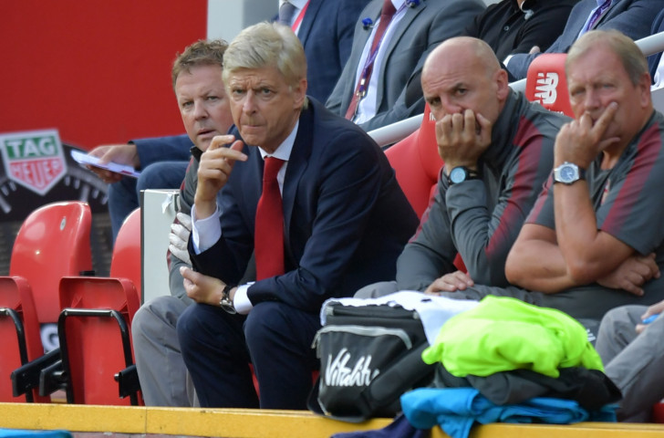 Message deleted - Arsenal's manager Arsene Wenger, second left, looks on as his side turn a 2-0 half-time deficit into a a 4-0 full-time deficit against Liverpool at Anfield on Sunday ©Getty Images