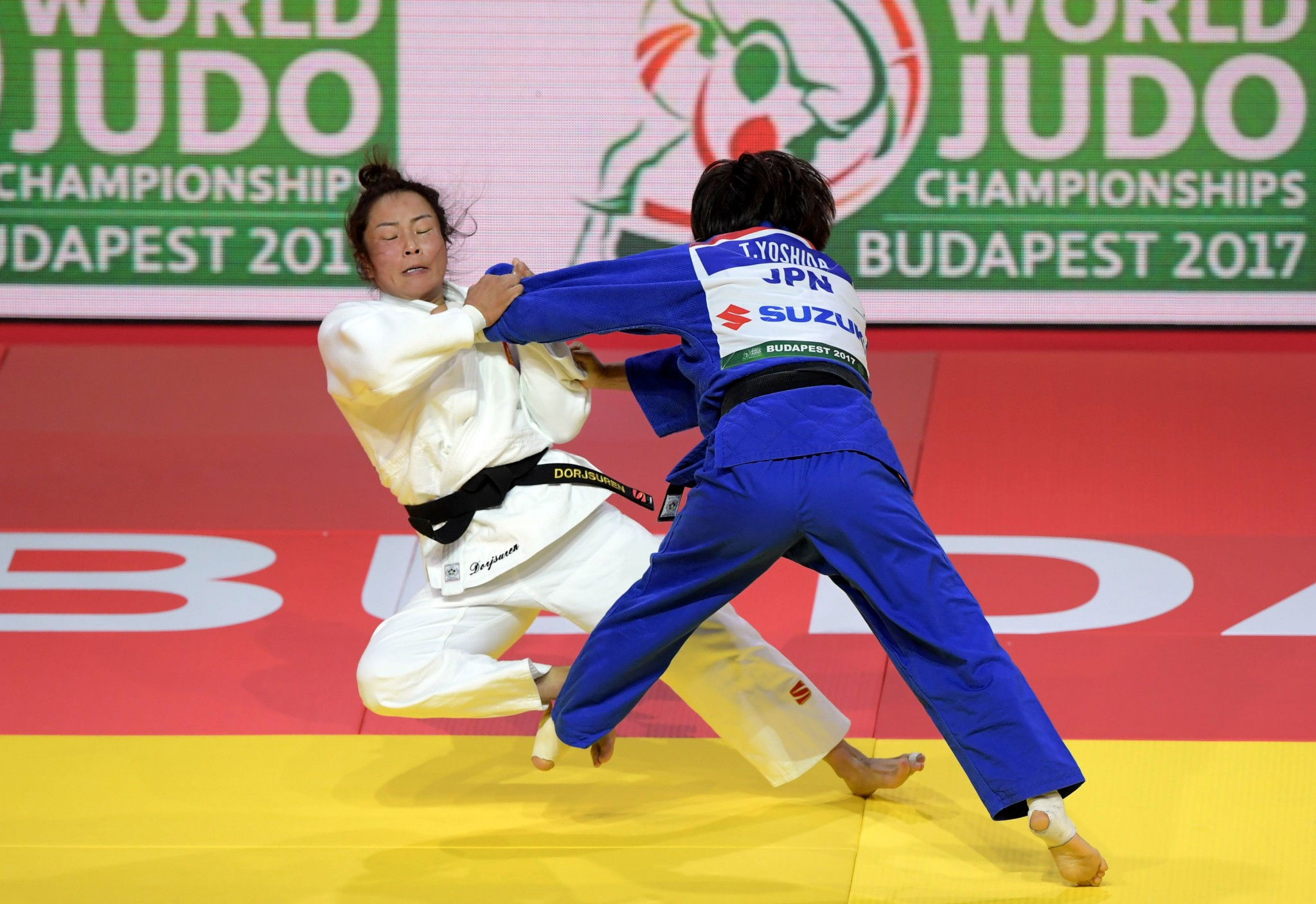 Mongolia's Sumiya Dorjsuren won a 13-minute battle with Japan's Tsukasa Yoshida ©Getty Images