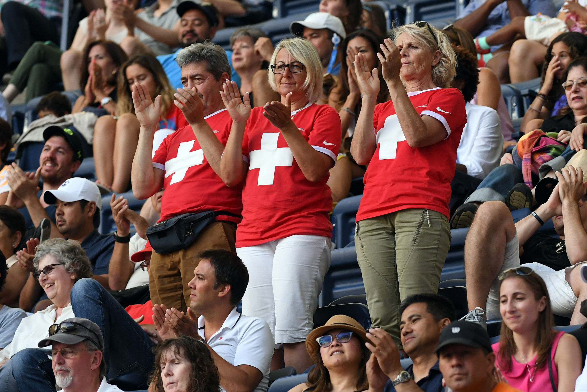Swiss fans cheer on Roger Federer during his five-set victory ©Getty Images