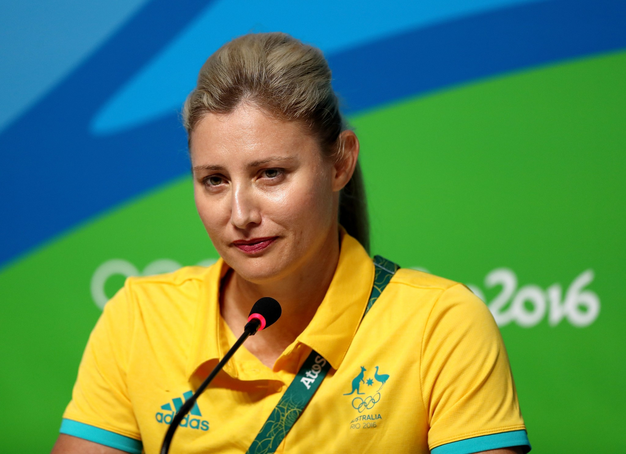 Australian Olympic Committee media director Mike Tancred had been given a severe reprimand after threatening to 