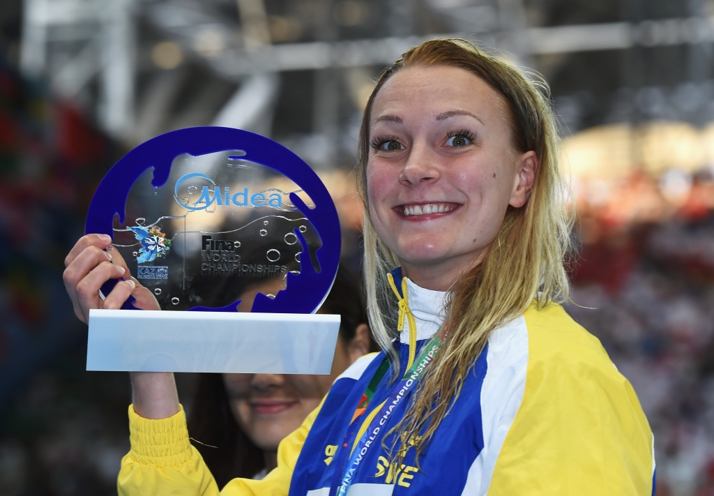 Sarah Sjostrom celebrated winning gold and breaking her own women's 100m butterfly world record ©Getty Images