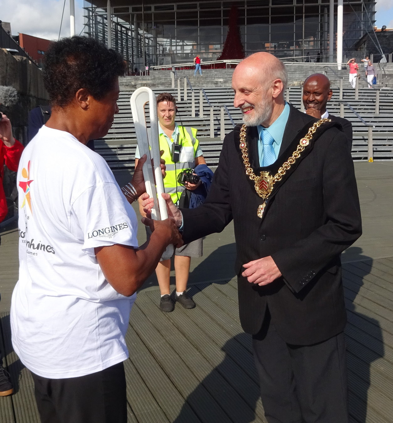 Gaynor Legall shows the baton to the Lord Mayor of Cardiff, Councillor Bob Derbyshire ©Philip Barker