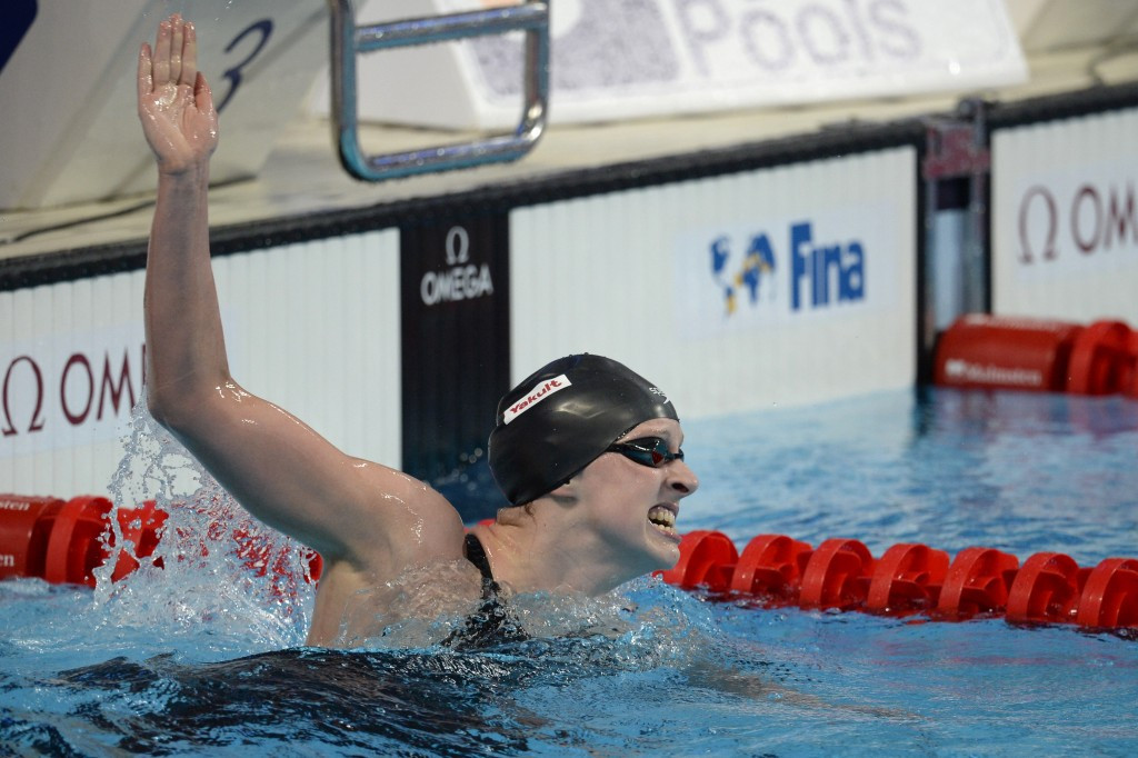 American youngster Katie Ledecky powered to victory in the women's 1,500m freestyle in a world record time