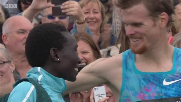New Zealand's Jake Robertson, second behind Sir Mo Farah in the men's race, proposes to his girlfriend Magdalyne Masa, fourth in the women's race - and is accepted...©BBC 