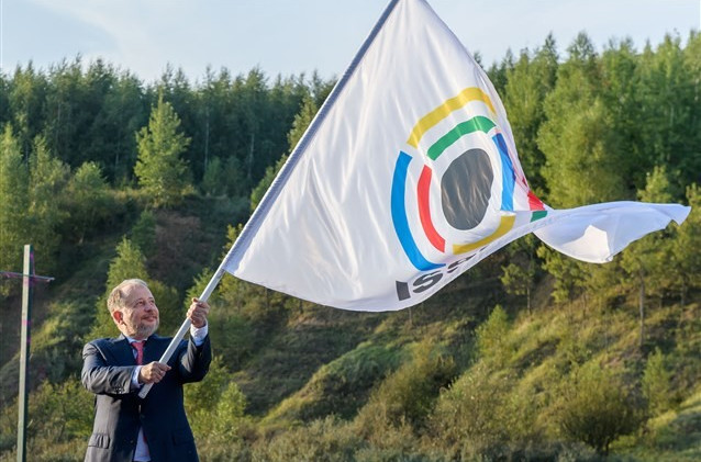 The ISSF flag is raised at the Closing Ceremony of the Shotgun World Championships held at the Fox Lodge Shooting Range in Moscow where Italy finished top with 17 medals from 22 events ©Getty Images