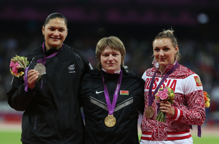 Valerie Adams of New Zealand (left) with shot put silver at the London 2012 Games. Before the year was out she would have he gold - following the positive test returned by Nadzheya Ostapchuk of Belarus - but not the satisfaction of victory in the Olympic Stadium ©Getty Images