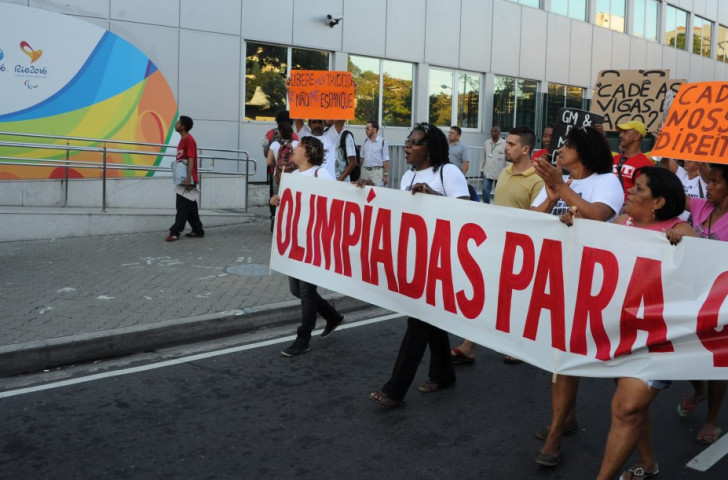 A small group of anti-Olympic protesters march ahead of the ceremony this evening ©Getty Images