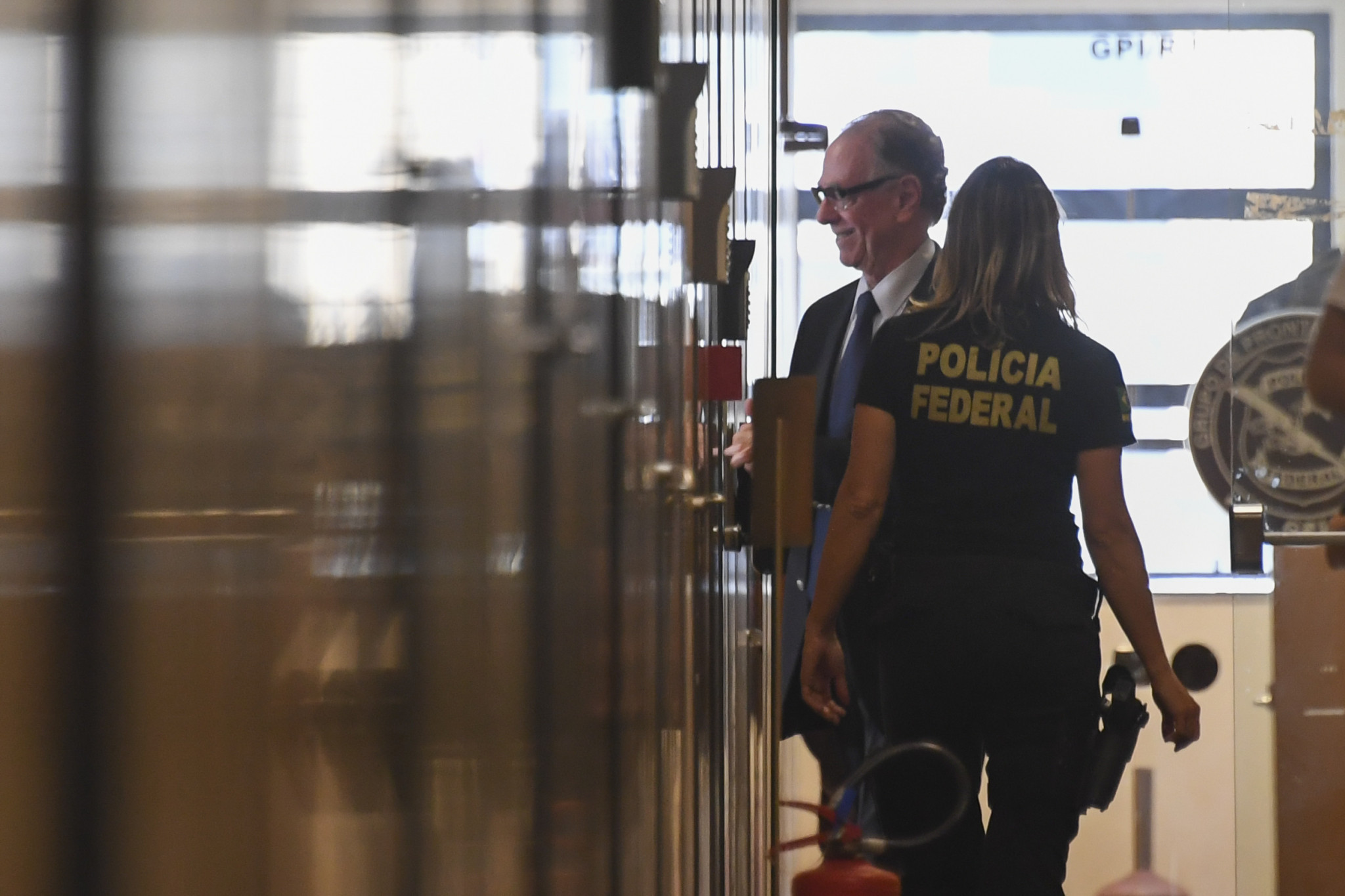 Rio 2016 President Carlos Nuzman entering the Federal Police Building in Rio de Janeiro last week after his house was searched following claims he had been involved in a scheme to help bribe IOC members from Africa ©Getty Images