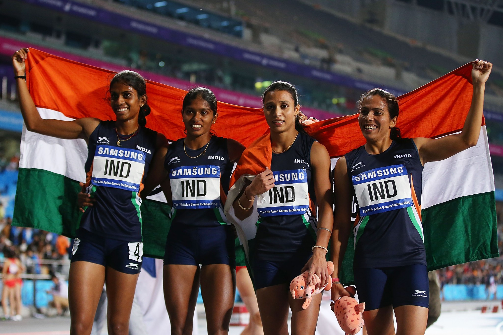 Priyanka Pawar, left, was a part of India's gold medal winning 4x400m relay team at Incheon 2014 ©Getty Images
