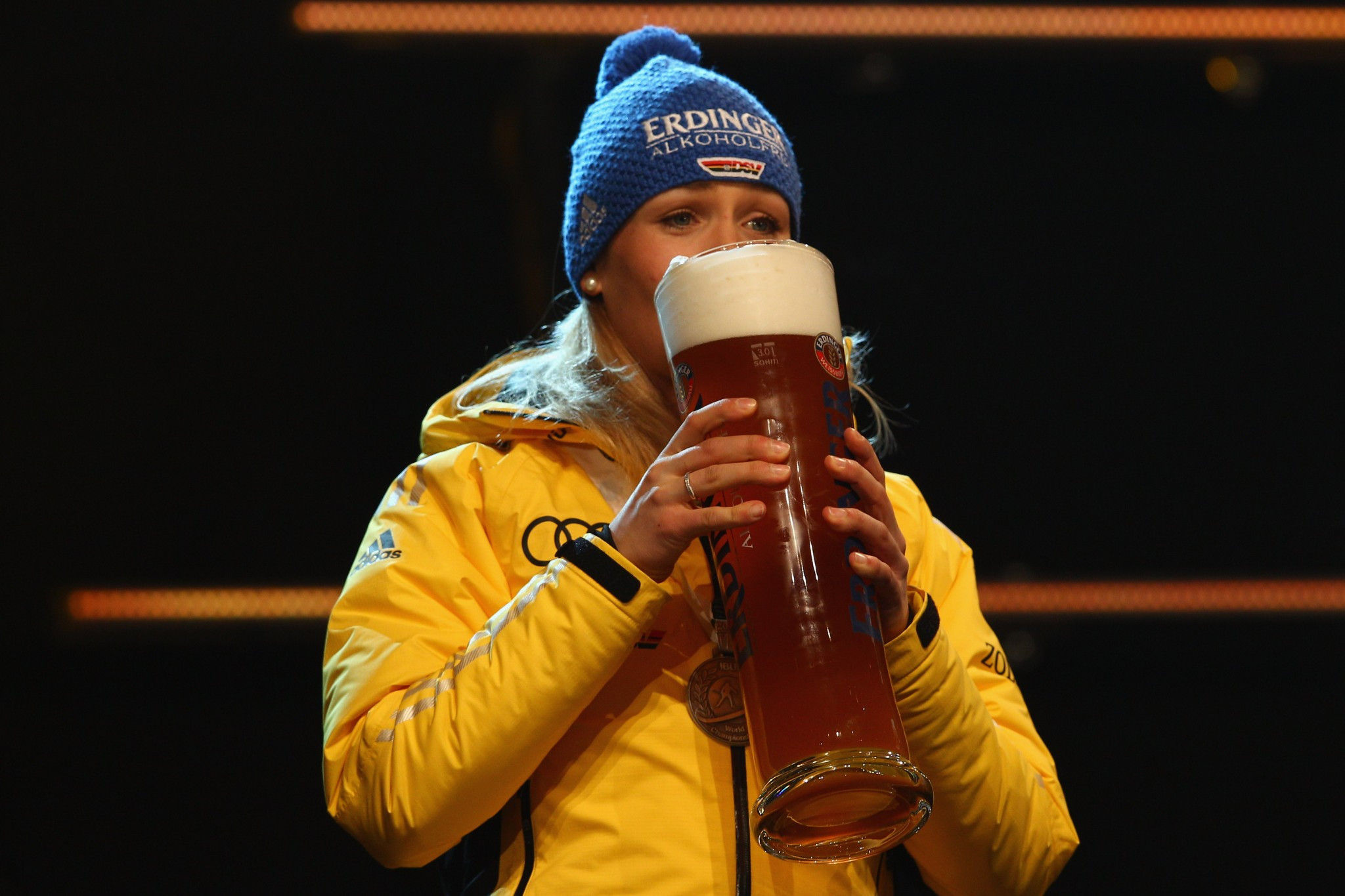 Magdalena Neuner of Germany with an Erdinger after a World Championship win in 2012 ©Getty Images