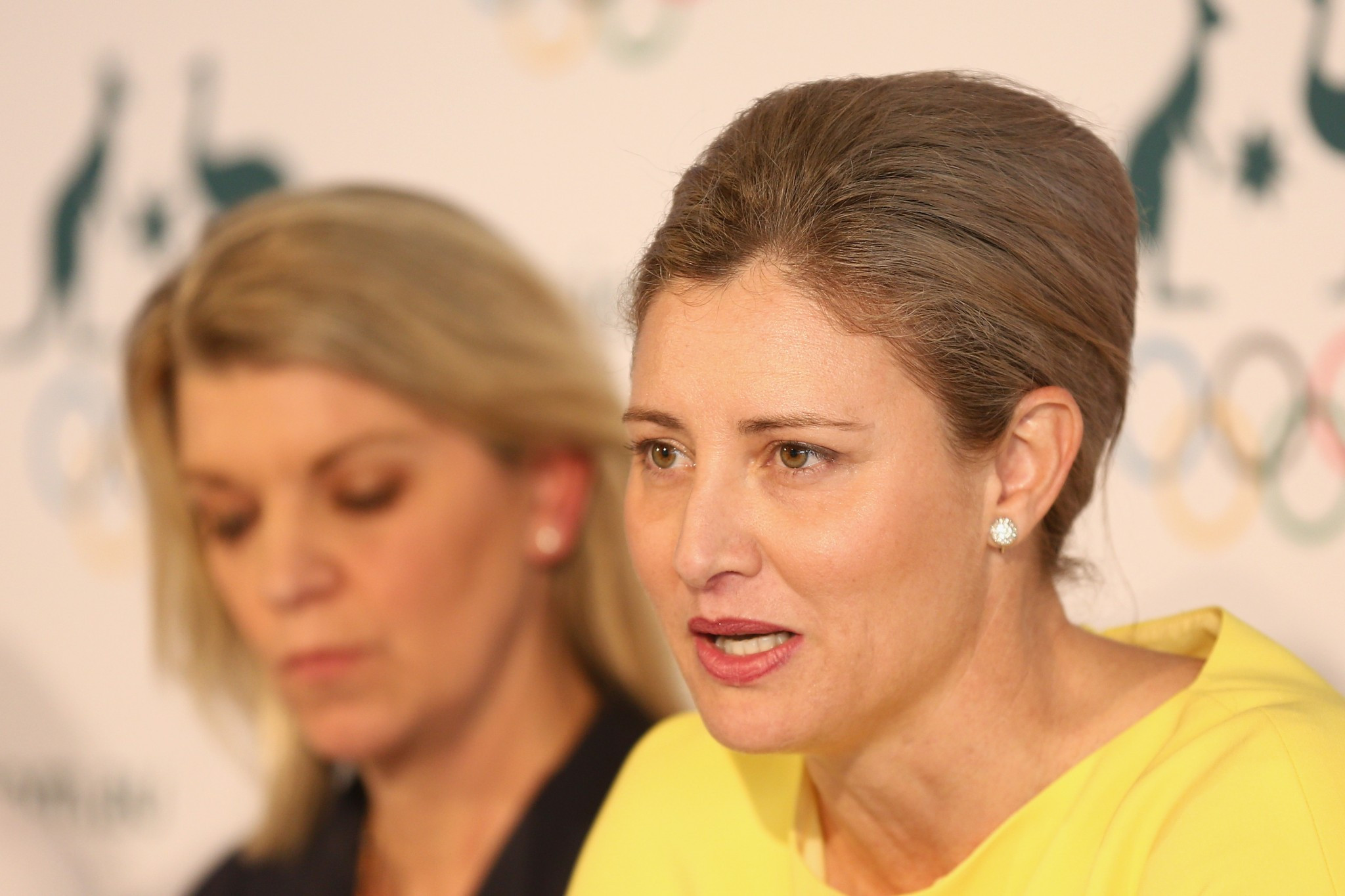 Australian Olympic Committee media director Mike Tancred had been given a severe reprimand after threatening to 