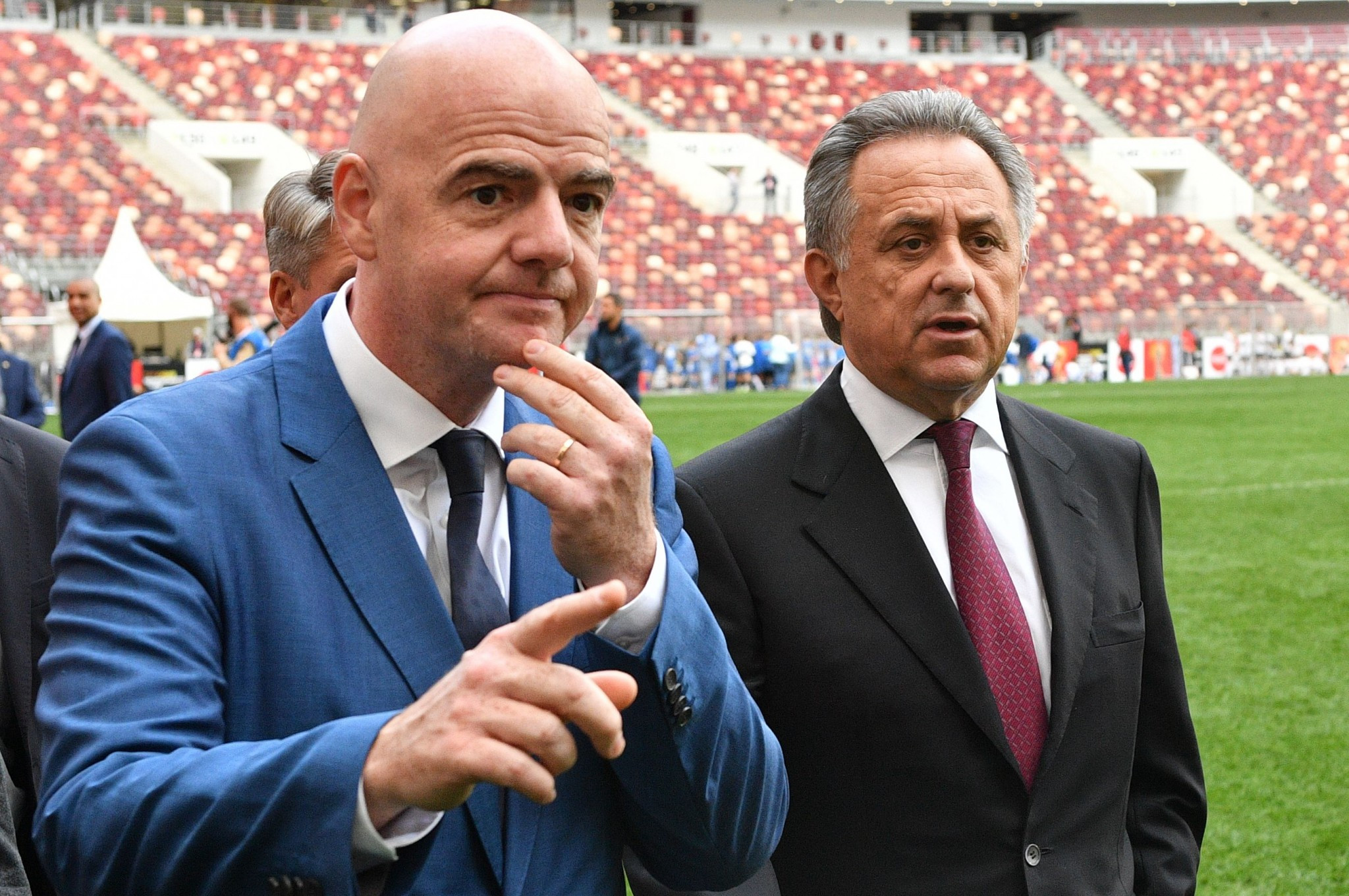 It has been alleged FIFA President Gianni Infantino, left, attempted to influence the decision to block Vitaly Mutko, right, from the organisation's Council ©Getty Images