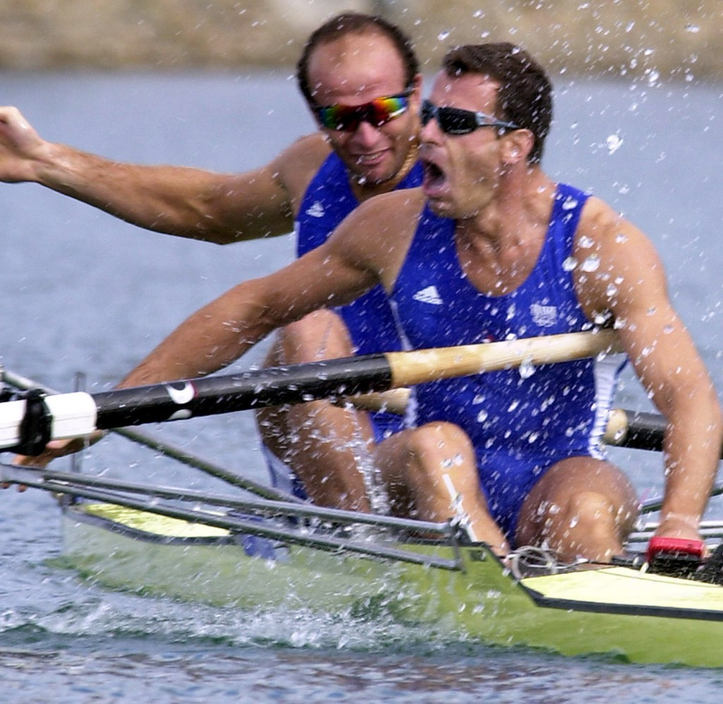 Jean-Christophe Rolland (front) celebrating Olympic gold at Sydney 2000 with Michel Andrieux ©Getty Image