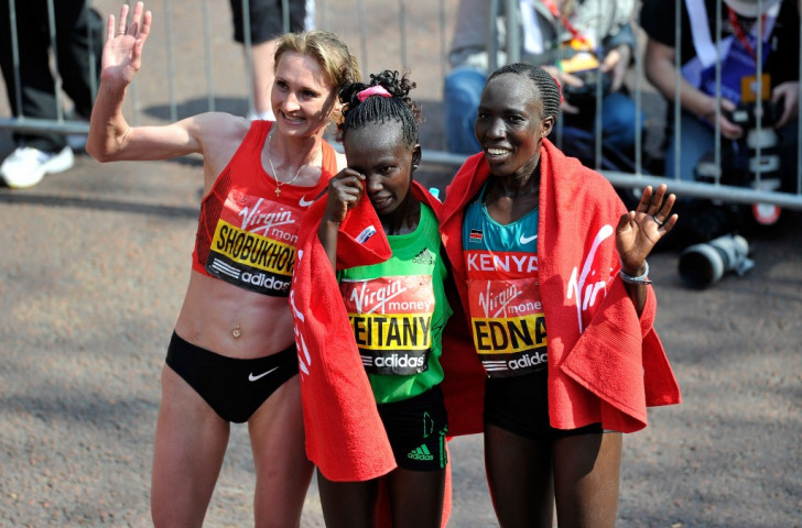 Liliya Shobukova, pctured (left) after winning the 2011 London Marathon title, will be stripped of the title and will face court action for the prize money after her doping positive. Mary Keitany (centre0 is now official winner, and fellow Kenya Edna Kiplagat (right) the silver medallist ©Getty Images