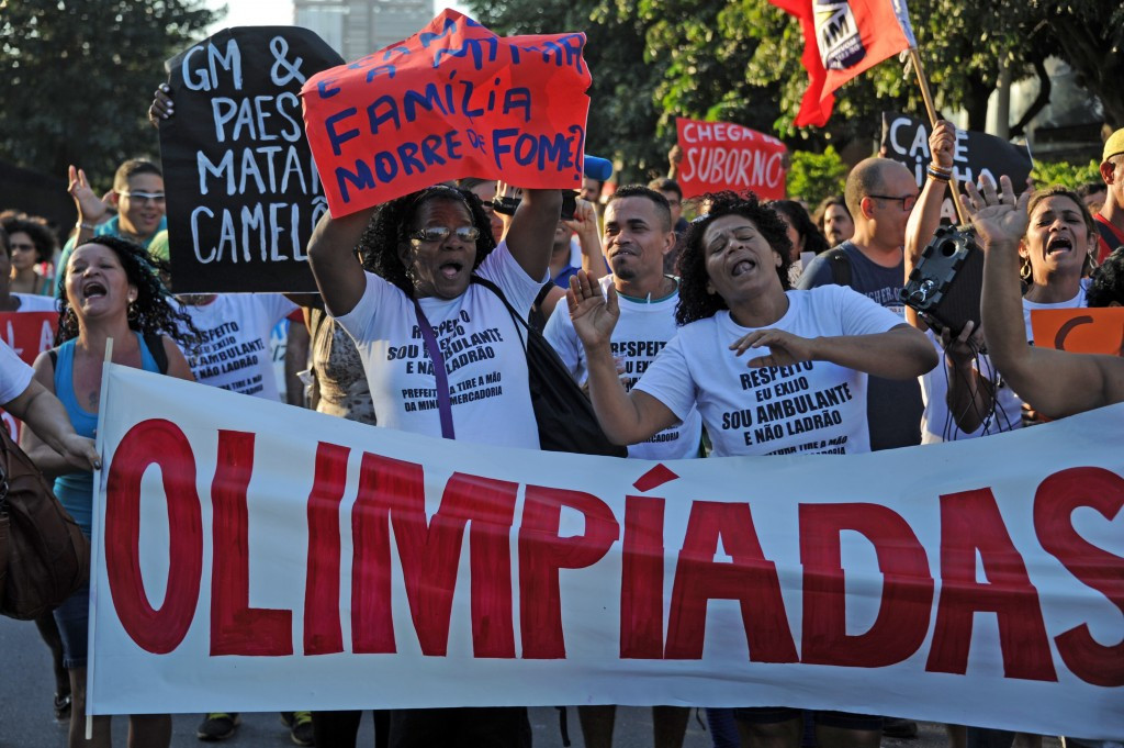 Protestors yesterday outside City Hall in Rio criticising projects assoiciated with the Games ©AFP/Getty Images
