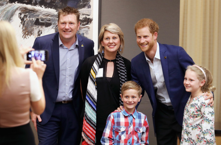 Prince Harry  with Australian veteran and athlete Mark Reidy, his wife Karen May, and their children at the True Love Patriot Symposium in Toronto ©Getty Images