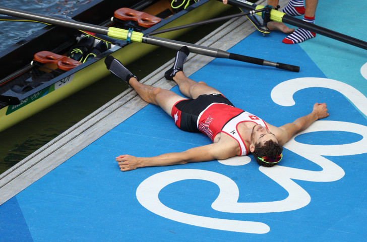 Switzerland's Lucas Tramer celebrates victory in the lightweight men's coxless four at the Rio Games - but now it is his event that looks likely to be floored following its removal from the Olympic programme for Tokyo 2020 ©Getty Images