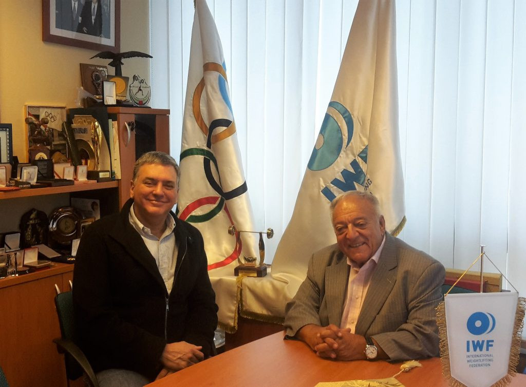 Jose Quiñones, left, met with IWF President Tamás Aján ©IWF
