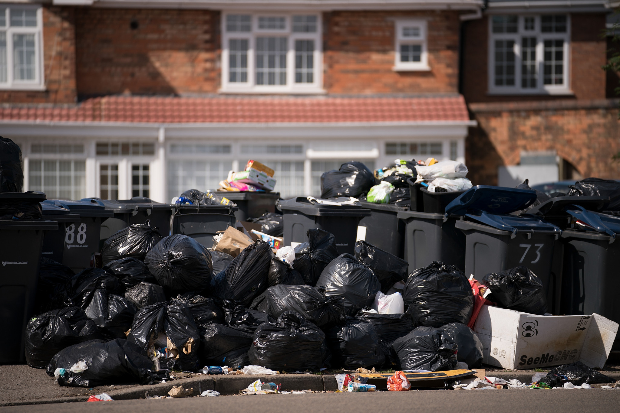 Rubbish has piled up in the streets of Birmingham because of a strike by refuse workers after the City Council cut services by £5 million as part of budget cuts ©Getty Images