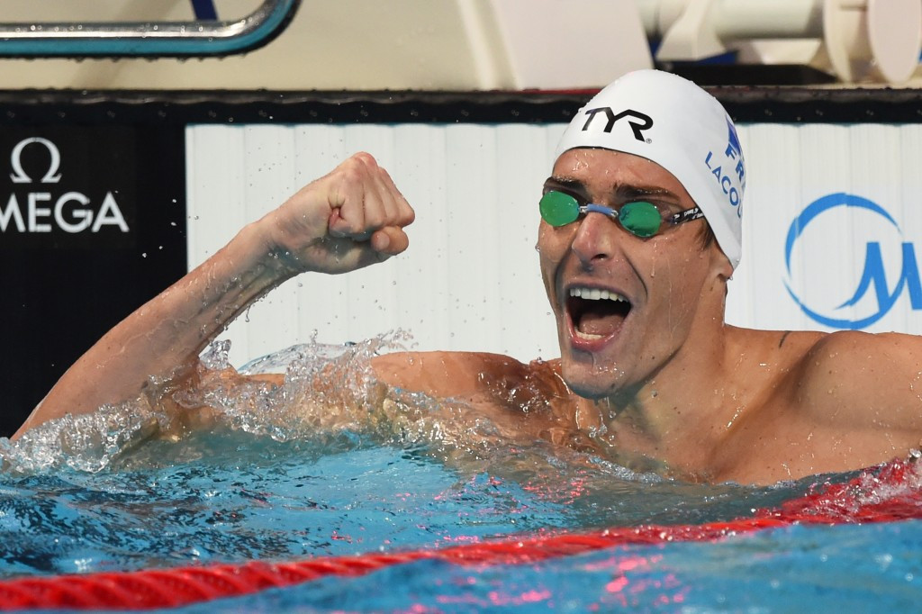 France's Camille Lacourt defended his men's 50m freestyle title