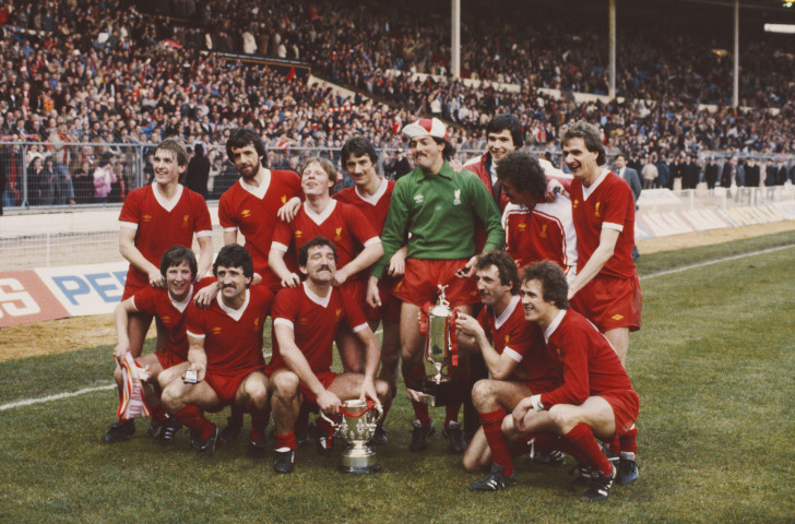 Liverpool celebrate after winning the first commercially-sponsored version of the Football League Cup in 1982 - the Milk Cup, which even had its own version of a trophy, held by Alan Kennedy in the front row, second right ©Getty Images