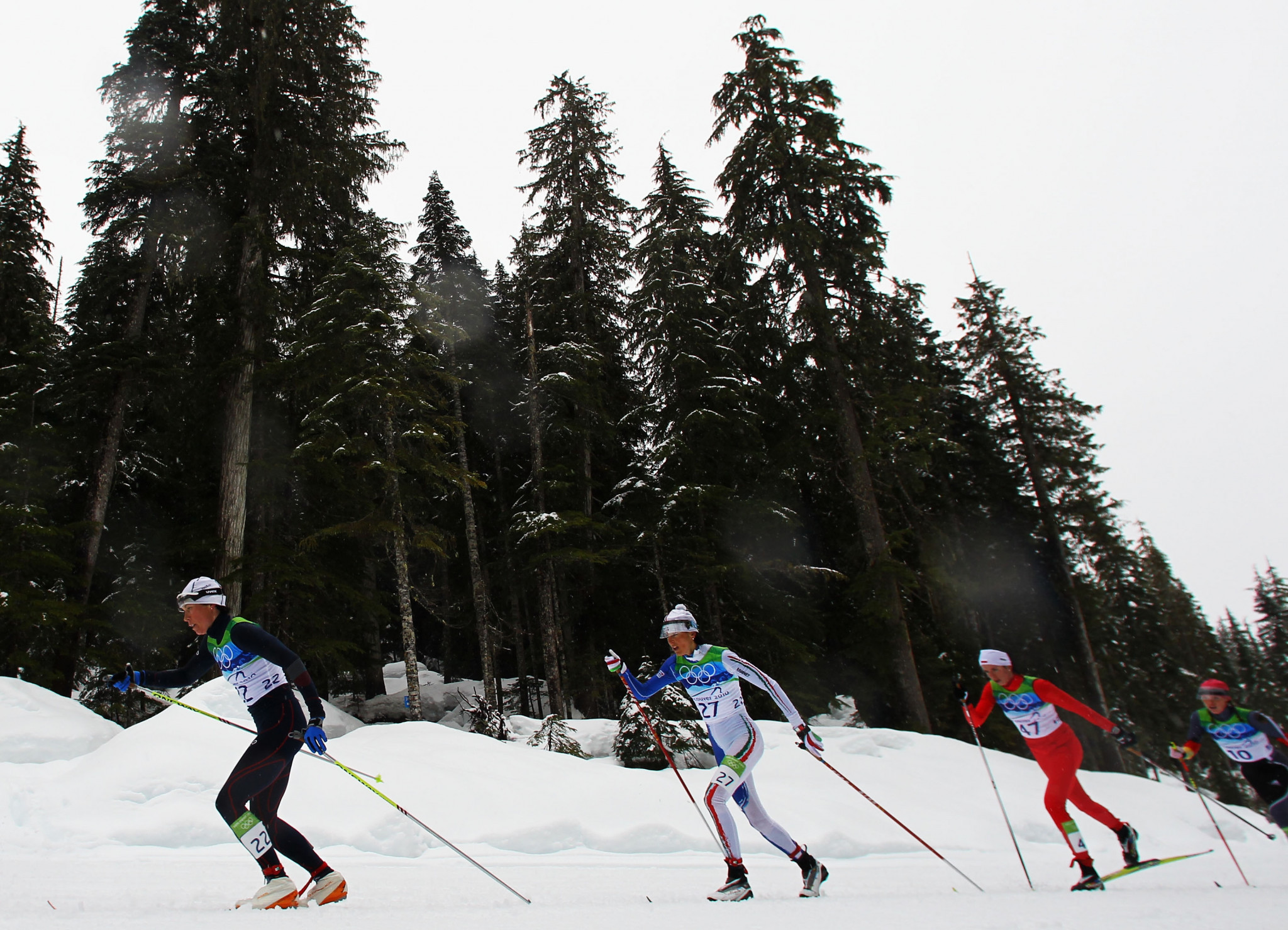 Polish cross-country skier Kornelia Marek, third left in red, is the only athlete to so far have been banned for doping at Vancouver 2010 but retests have revealed at least one other athlete tested positive ©Getty Images