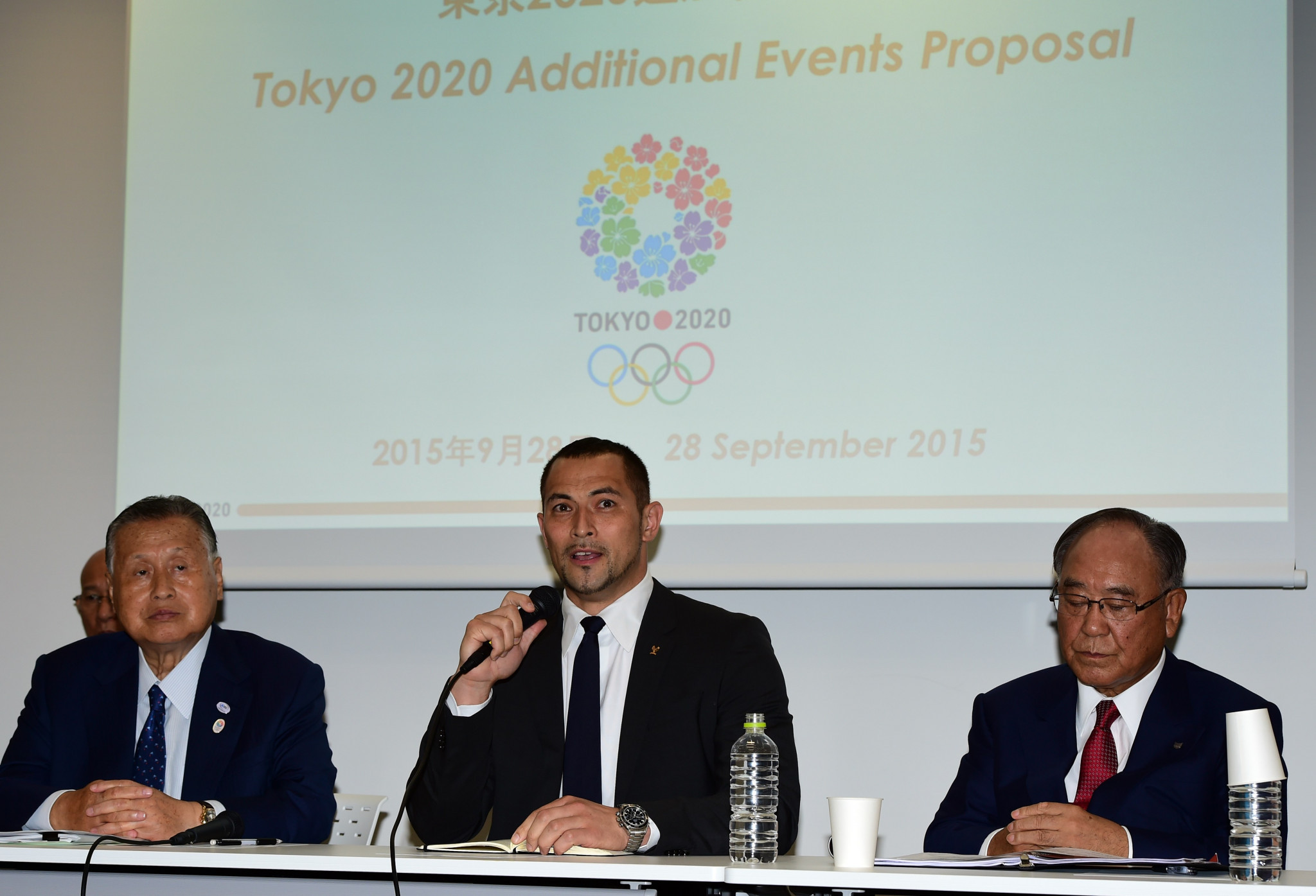 Tokyo 2020 sports director Koji Murofushi, centre, has put forward a different tournament system ©Getty Images