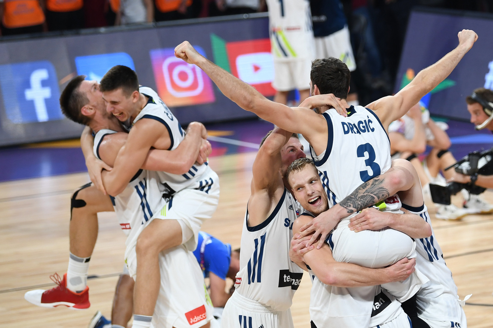 Slovenia's players celebrate after defeating Serbia during the FIBA Eurobasket 2017 men's final but now the world governing body claim the international game is under threat ©Getty Images