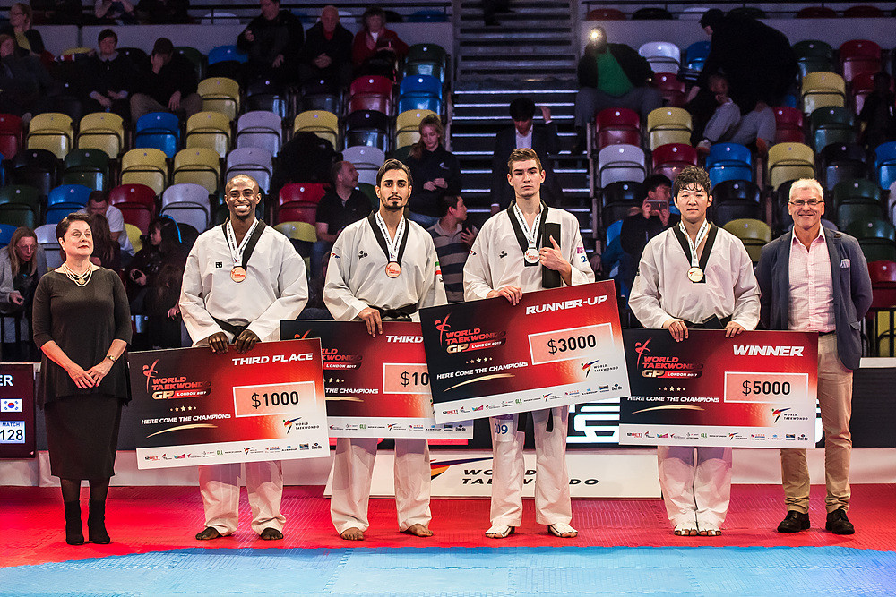 The podium also included Britain's Mahama Cho, left, who lost in the semi-finals to Aiukaev, third from left ©World Taekwondo