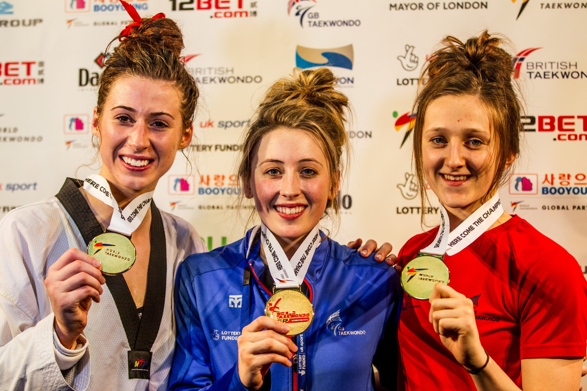 Bianca Walkden, left, and Jade Jones, centre, both won gold medals today at the World Taekwondo Grand Prix series event in London, increasing hosts Great Britain's gold medal tally to three after success for Lauren Williams, right, yesterday ©GB Taekwondo