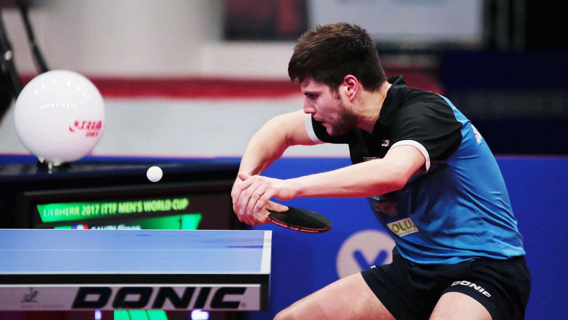 Dimitrij Ovtcharov won an all-German final against Timo Boll ©ITTF