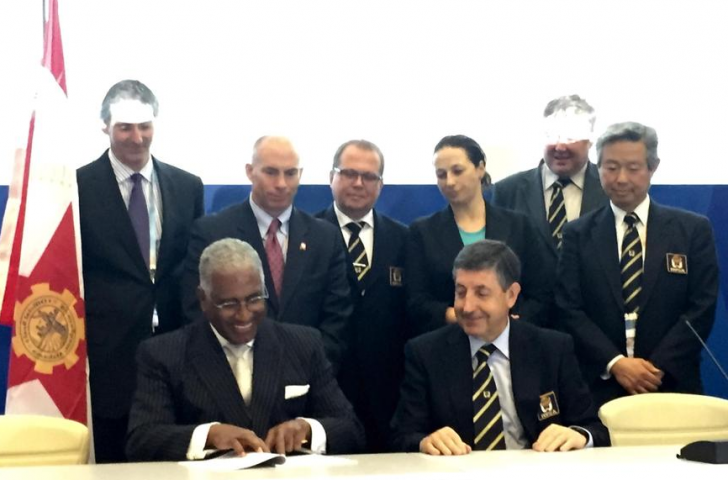 Officials from Birmingham, Alabama, sign the official ratification that they will host the 2021 World Games at the end the International World Games Association General Assembly in Sochi today 