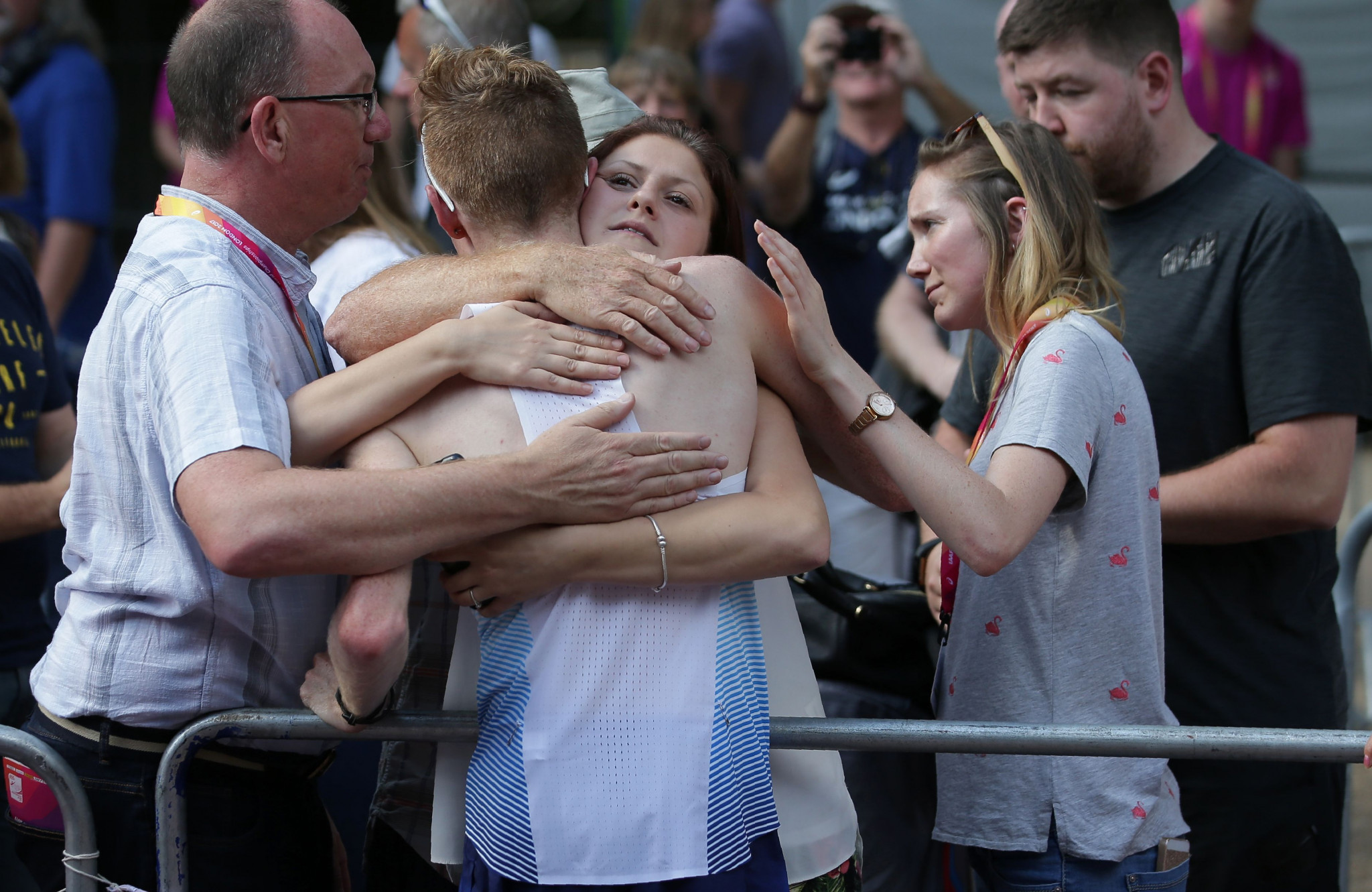 Tom Bosworth is consoled by family and friends after being disqualified at the World Championships ©Getty Images