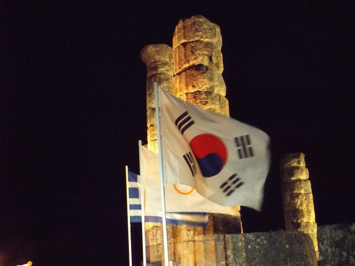The South Korean flag flew alongside those of Greece and the International Olympic Committee in Delphi ©ITG