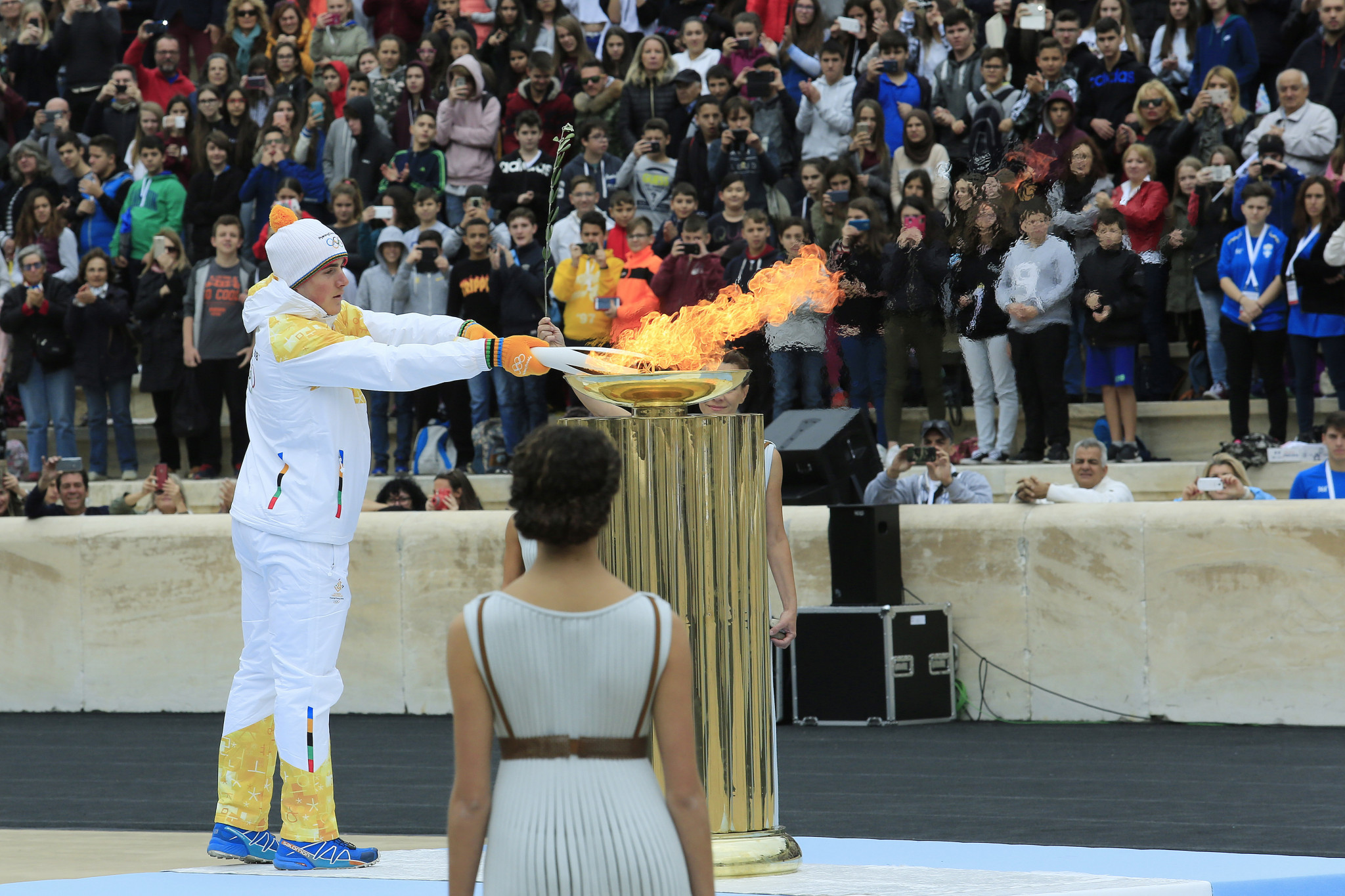 Skier Ioannis Proios lights the Olympic flame during today's ceremony ©Getty Images