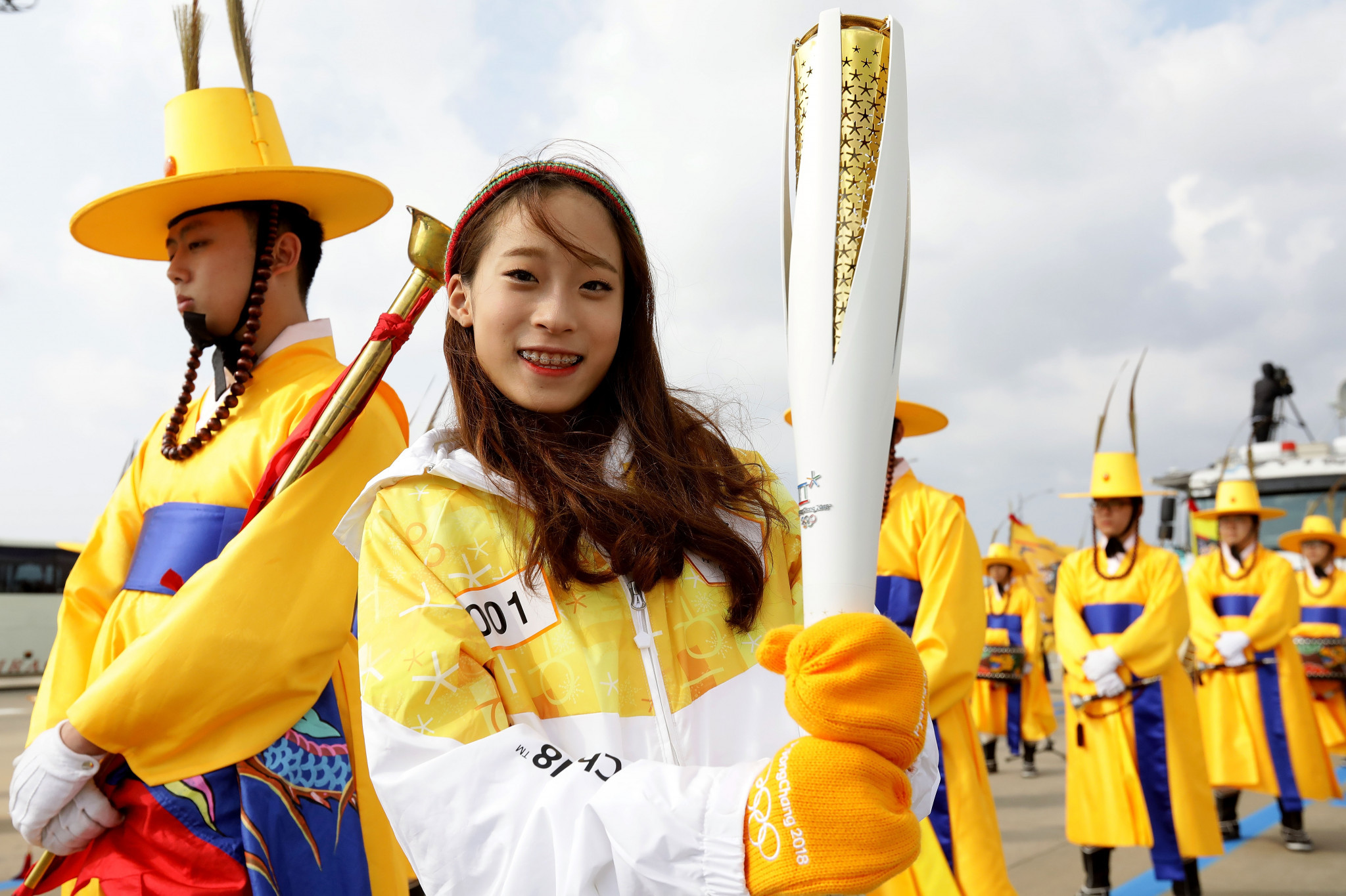 South Korean figure skater You Young holds the Pyeongchang 2018 Winter Olympics Torch during a Torch Relay in Incheon, South Korea ©Getty Images