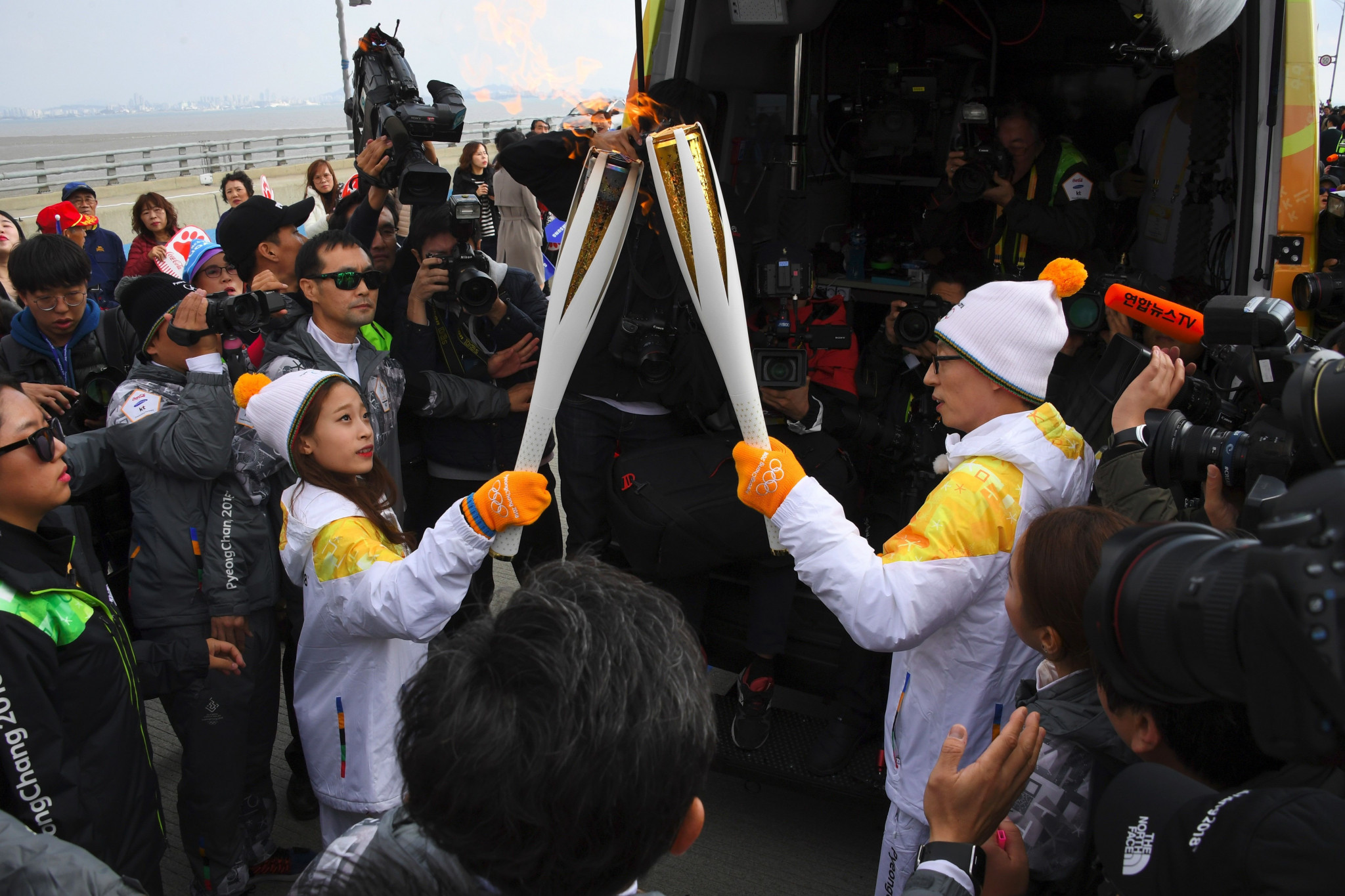 Television star and comedian Yoo Jae-suk then continued the Relay after receiving the torch from You ©Getty Images