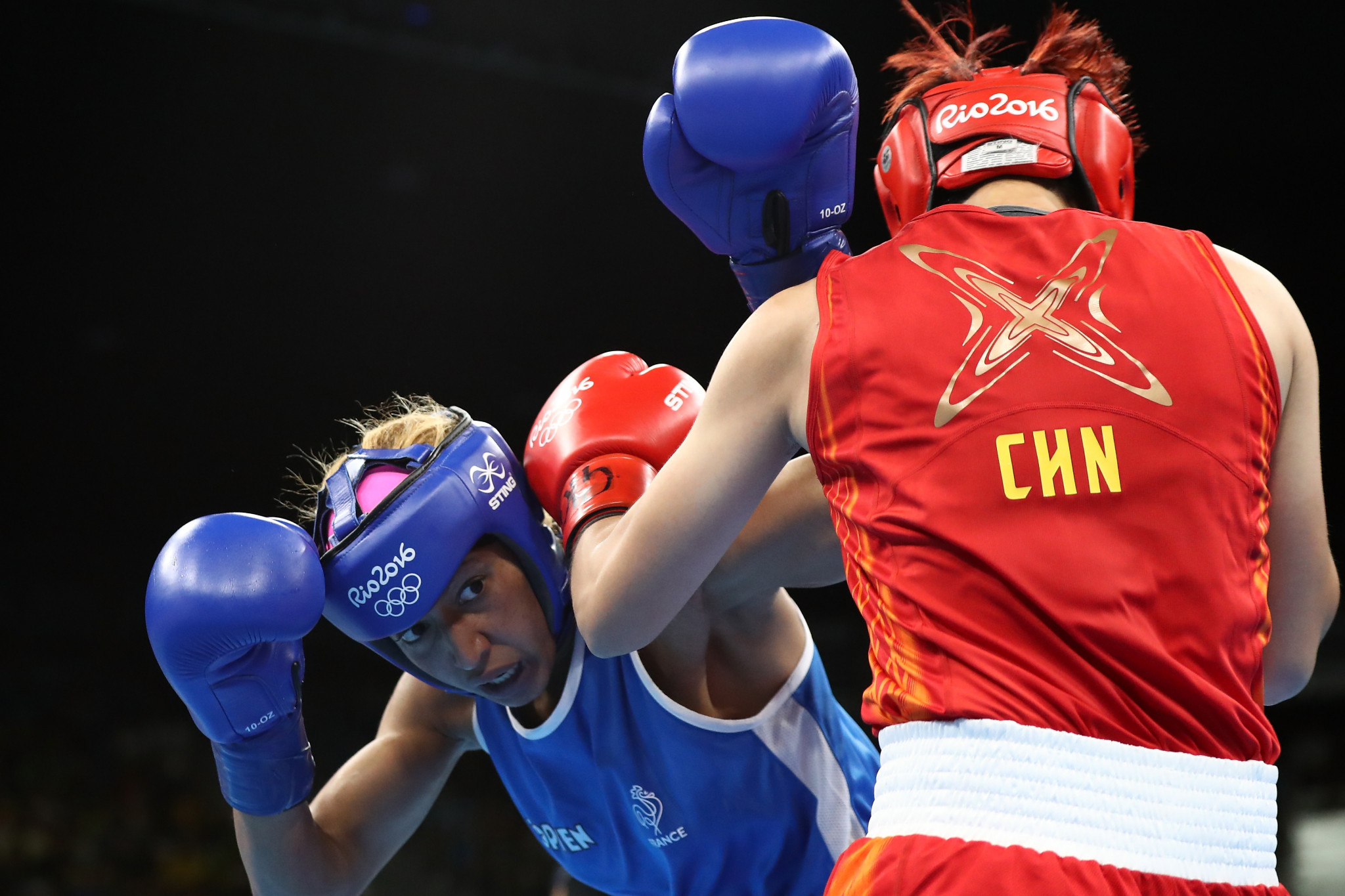 Olympic silver medallist Yin Junhua, right, has dropped down to featherweight for the event in Vietnam ©Getty Images