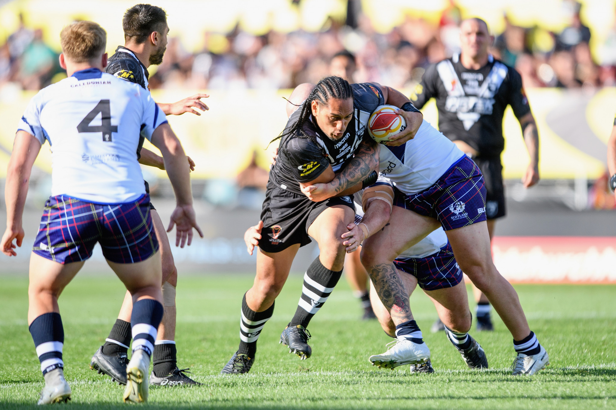 Martin Taupau of the Kiwis is tackled by Dale Ferguson of Scotland during today's World Cup match between the New Zealand Kiwis and Scotland in Christchurch, New Zealand ©Getty Images