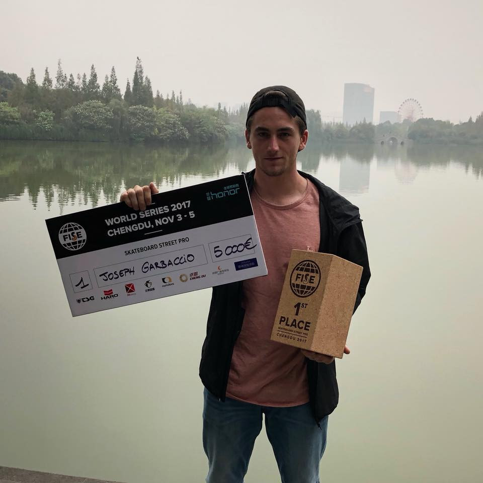 Joseph Garbaccio pictured with his winners' cheque after collecting the the FISE Skateboard Street Pro competition in Chengdu, China ©Facebook