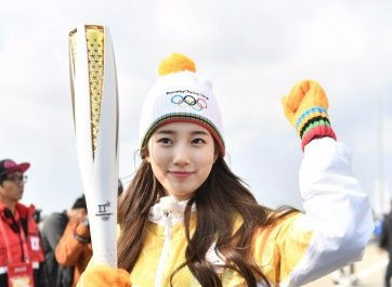 Special mission well underway for Olympic Torch as continues to make a huge impact on South Korea journey