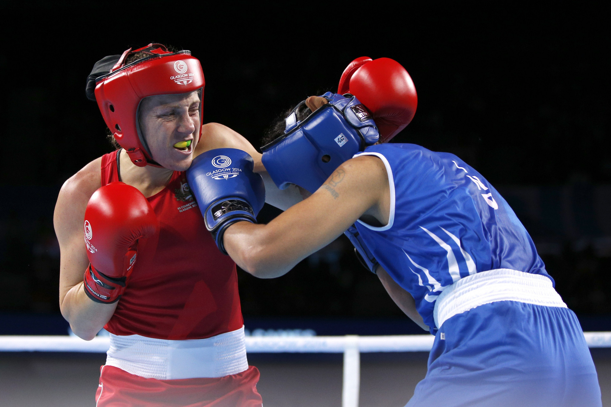 Australia's Shelley Watts beat India's Laishram Devi in the final of the lightweight division to claim the Commonwealth Games gold medal at Glasgow 2014 ©Getty Images