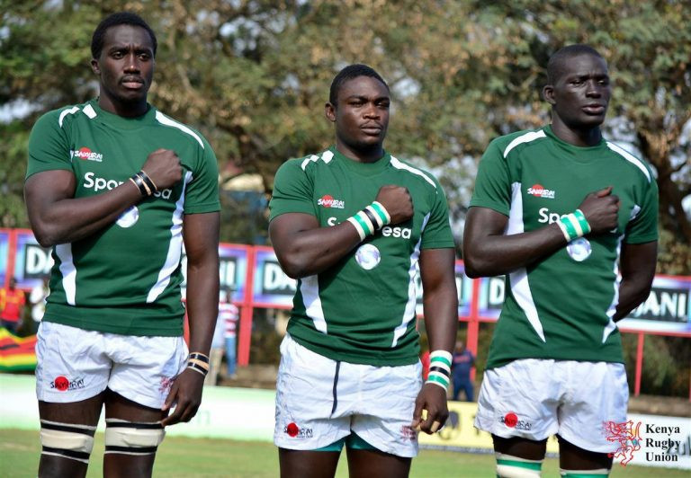 Mike Okombe, centre, with teammates ahead of the national anthem as Kenya played Hong Kong in August 2016 ©Kenya Rugby Union