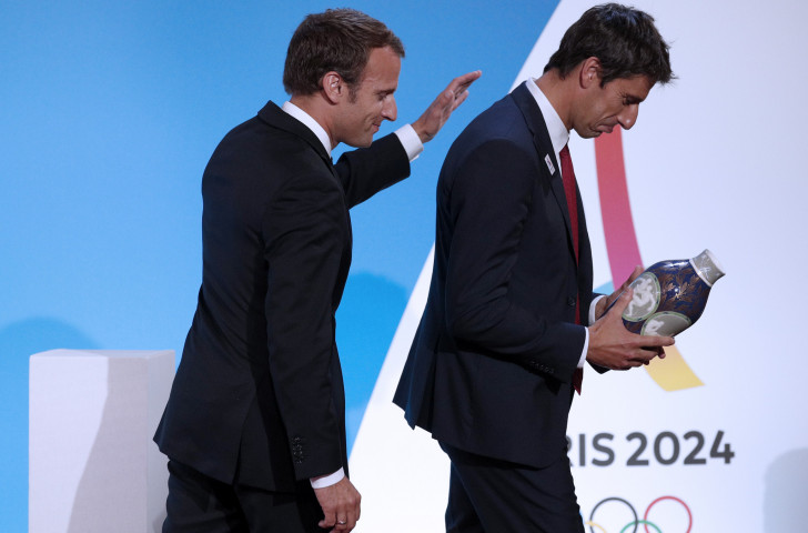 Paris 2024 President Tony Estanguet, on right, pictured getting a pat on the back from French President Emmanuel Macron, will consult with elite French athletes tomorrow to help shape the vision of the Paris 2024 Games ©Getty Images