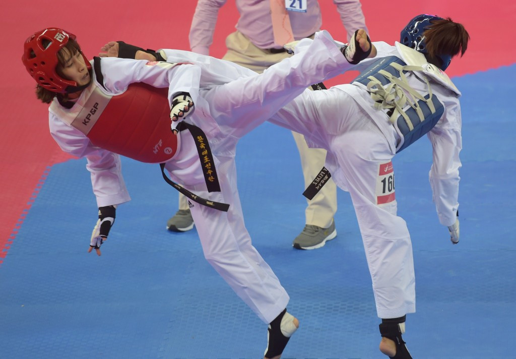 Two-time world champion Kim So-hui took gold in the women's under 49kg category by beating Zhaoyi Li of China 